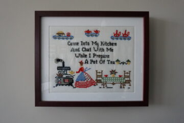 framed embroidery sampler